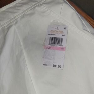 Michael Kors white shorts.